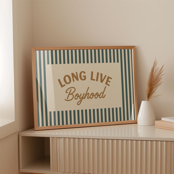 a picture of a long live boyhood sign on a shelf