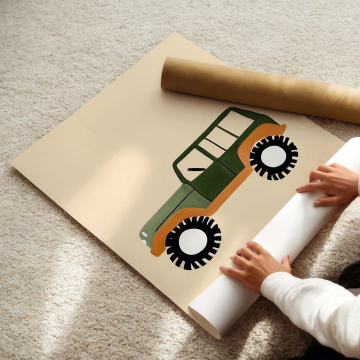 a child is holding a roll of paper with a tractor on it