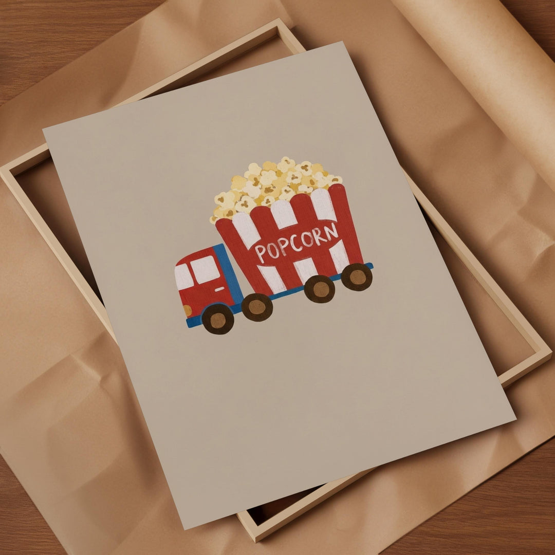 A framed print with a cartoon image of a red and white popcorn truck.