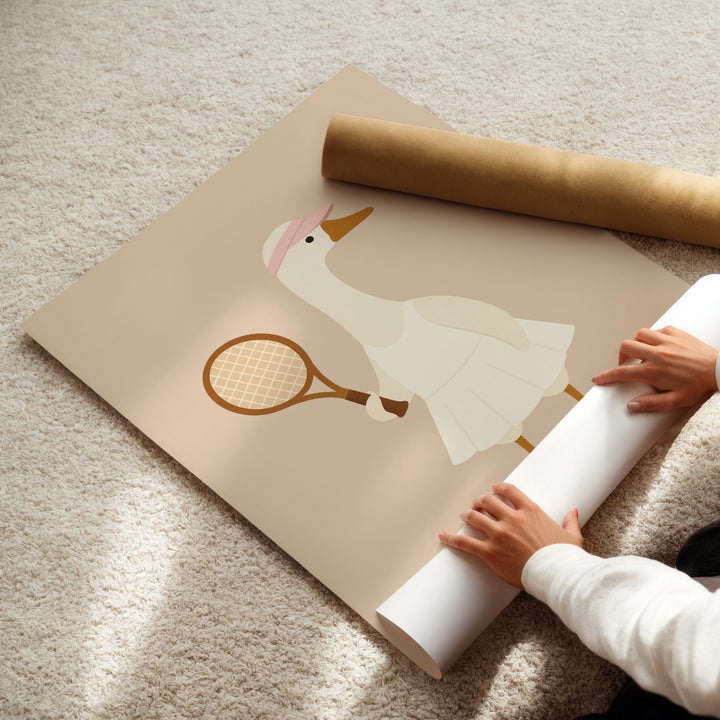 a person is holding a roll of paper with a picture of a duck on it