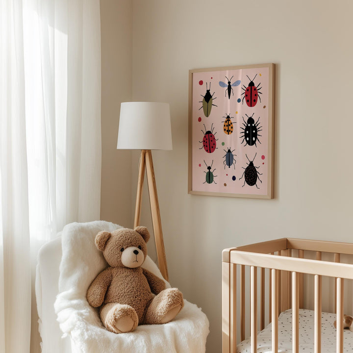 a teddy bear sitting in a chair next to a crib