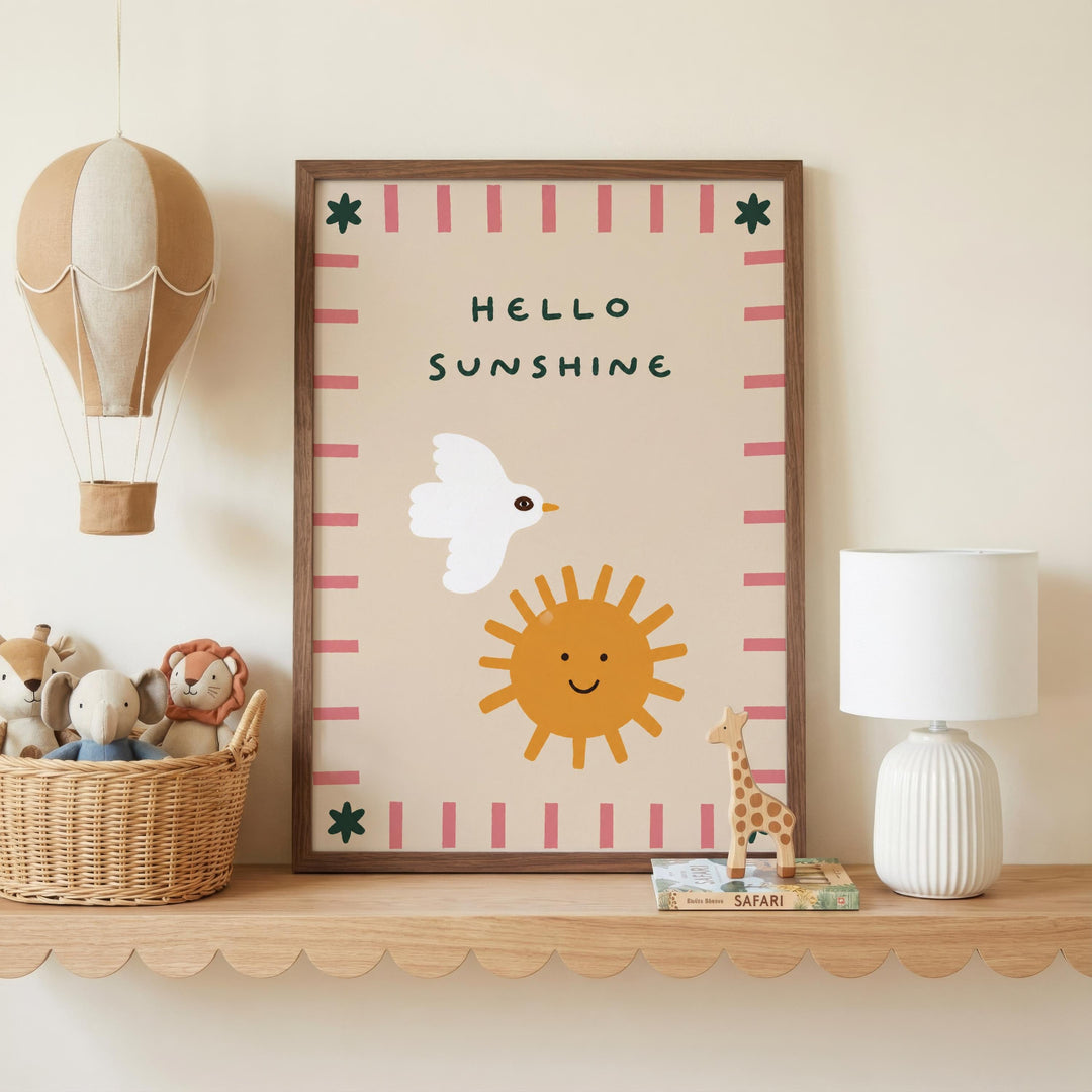 a shelf with a framed poster, a basket of stuffed animals, a lamp, and a book.