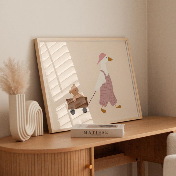 a picture of a duck pulling a wagon with a duck on it