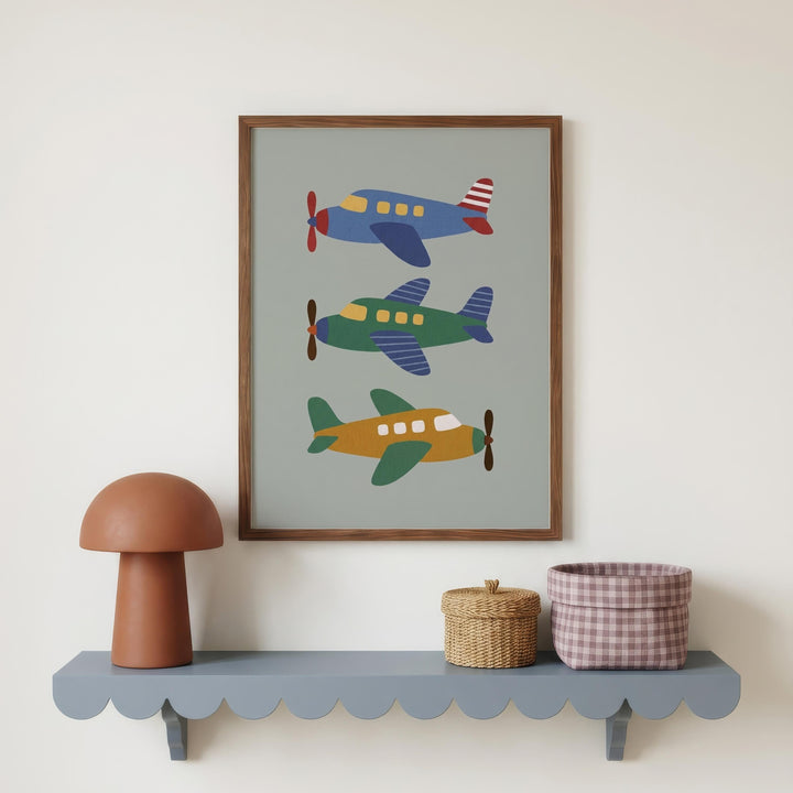 a shelf with a brown mushroom-shaped lamp, a woven basket, and a framed picture of three colorful airplanes.