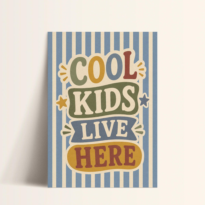 a colorful poster with the text "COOL KIDS LIVE HERE" prominently displayed.