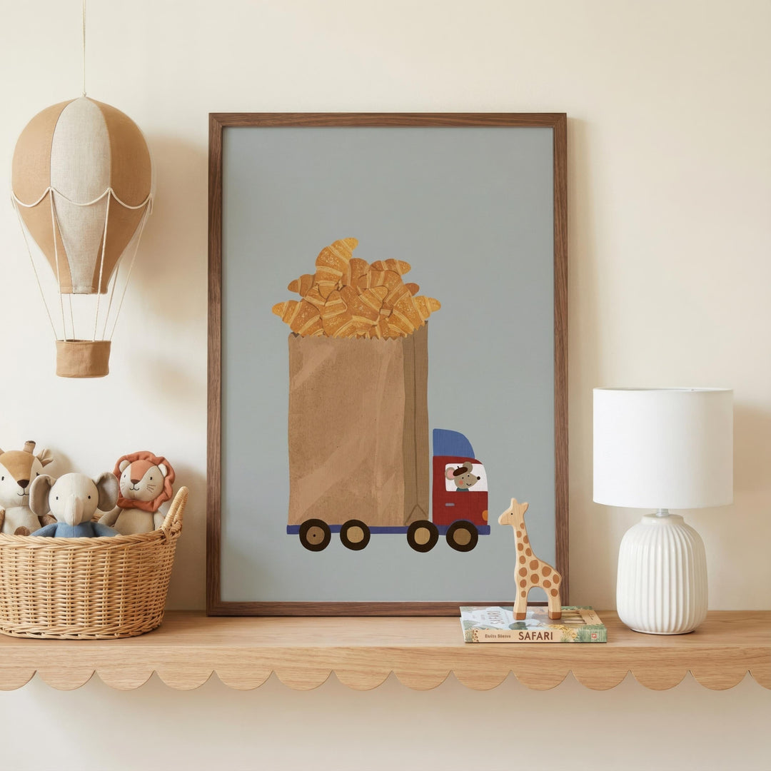 a shelf with a framed picture of a truck carrying a basket of pastries, a toy giraffe, a stuffed animal, and a lamp.