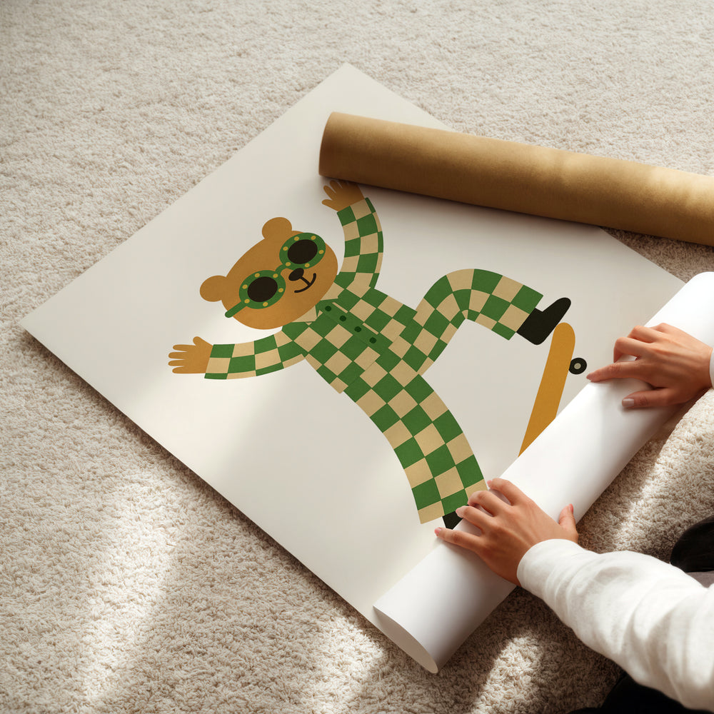 a person holding a roll of paper with a picture of a teddy bear on it