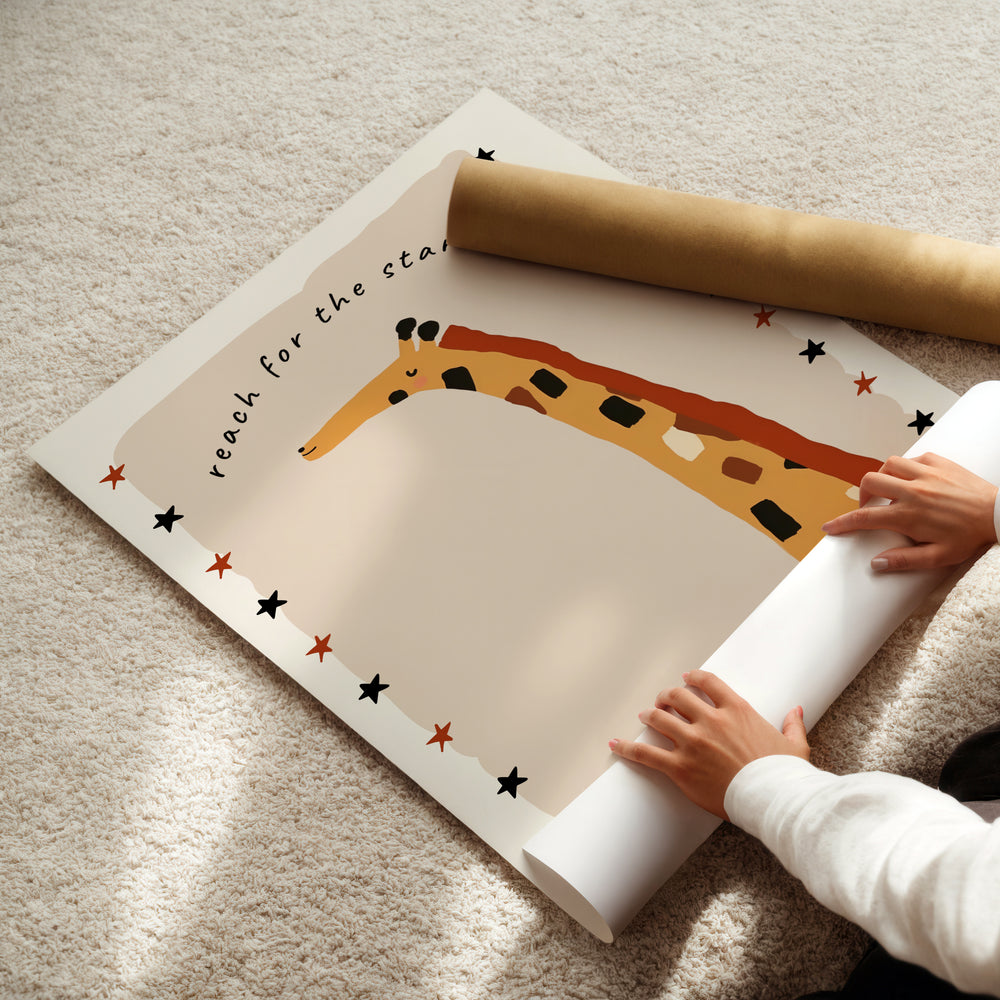 a child holding a roll of paper with a picture of a giraffe on