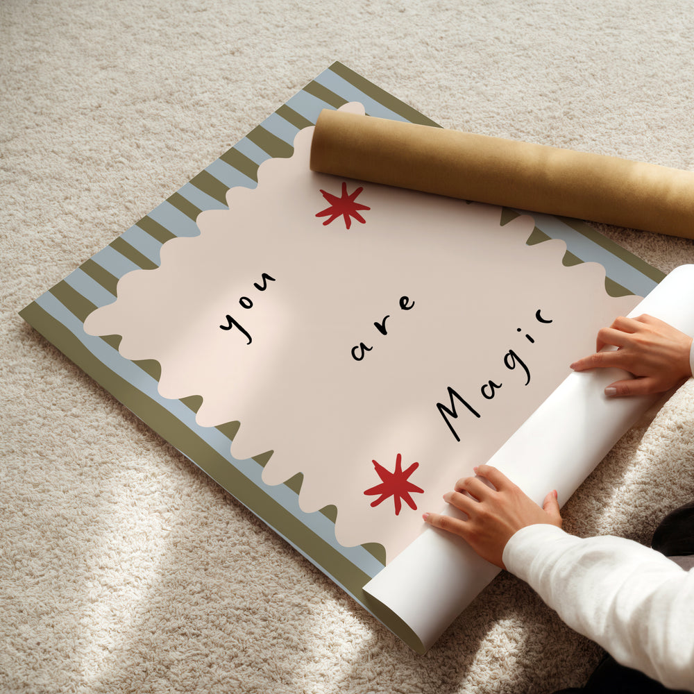 a child is holding a roll of paper with a message on it