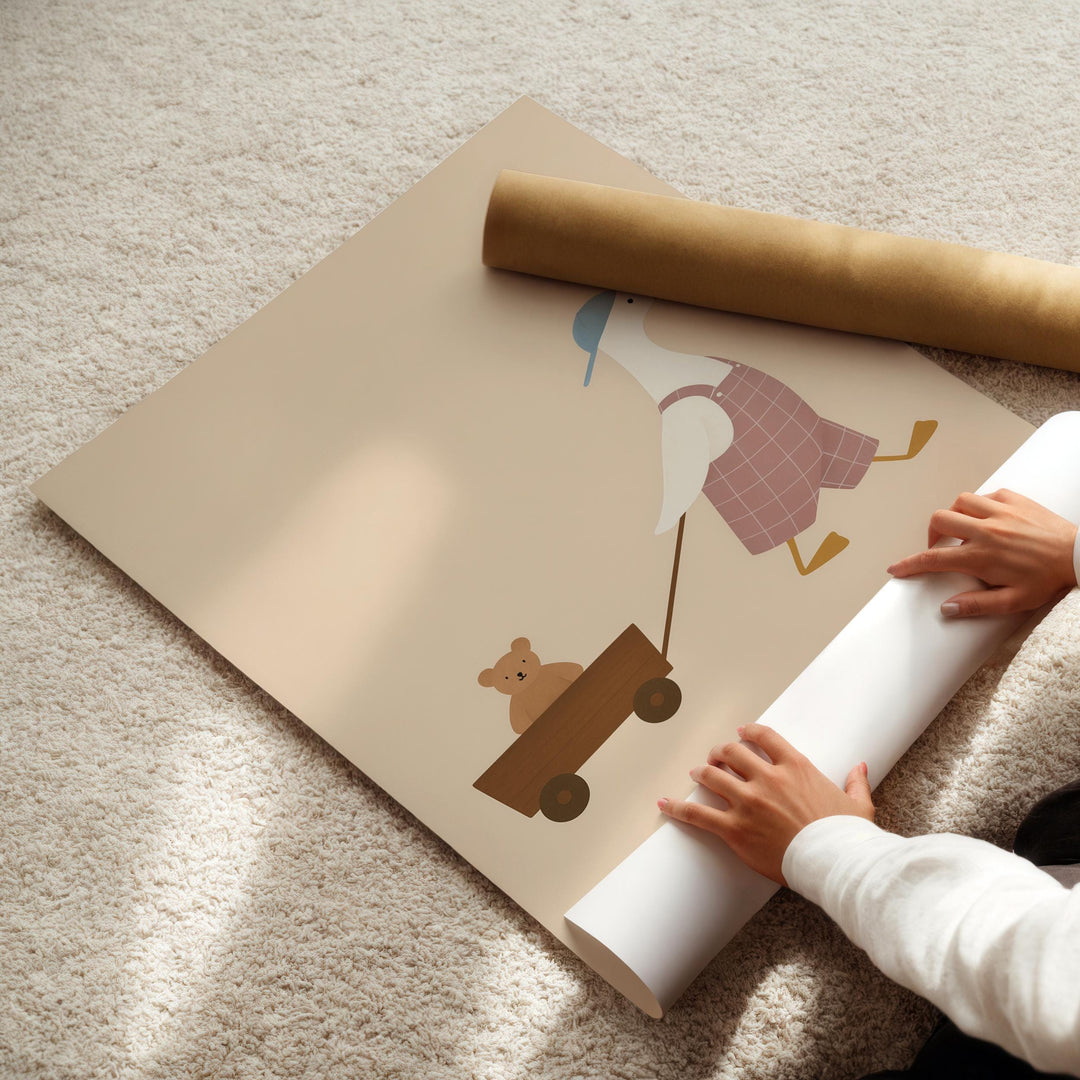 a person holding a roll of paper on the floor