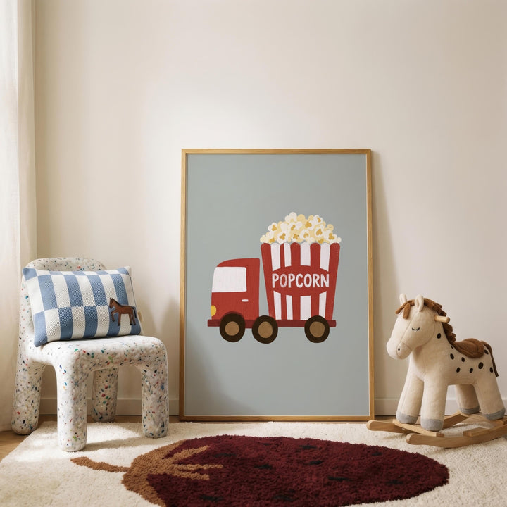 a child's bedroom with a large poster of a red truck carrying a red and white popcorn bucket, a blue and white checkered pillow, a rocking horse, and a red rug on the floor.
