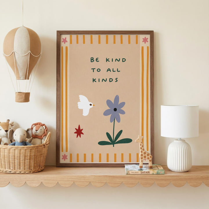a framed poster with a motivational message, a hot air balloon, a basket of stuffed animals, a lamp, and a shelf with books.