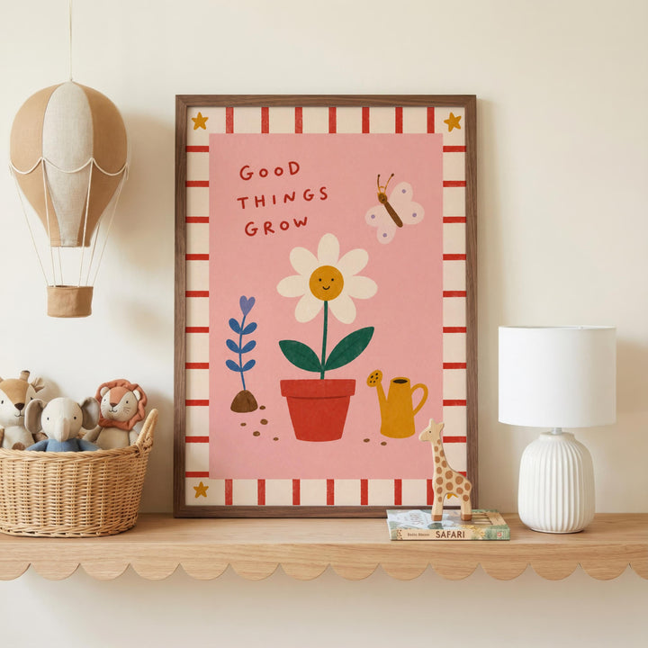 a framed poster with a pink background, a flower, and a butterfly, along with a basket of stuffed animals and a lamp on a shelf.