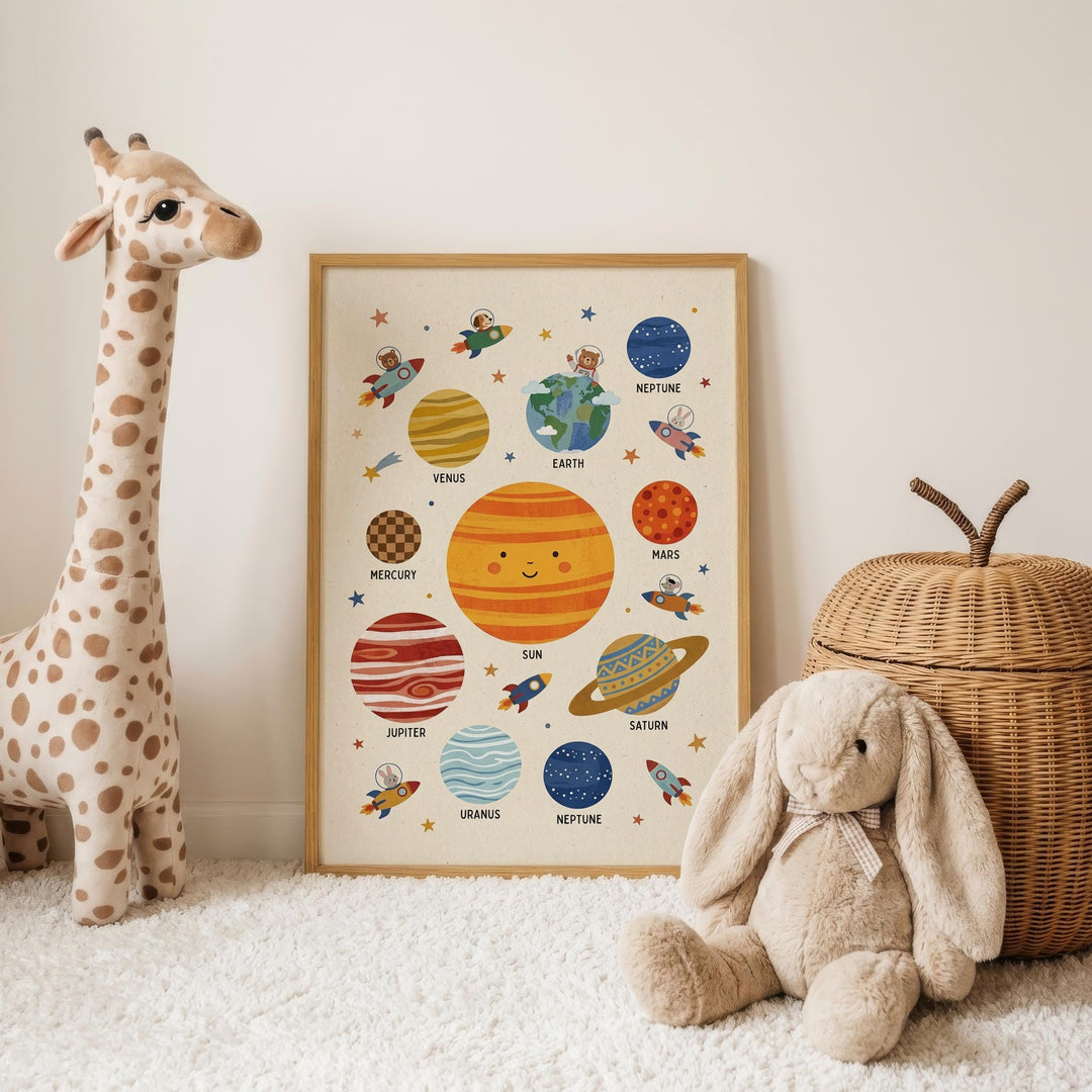 a giraffe and a stuffed rabbit, both placed next to a framed poster of the solar system.