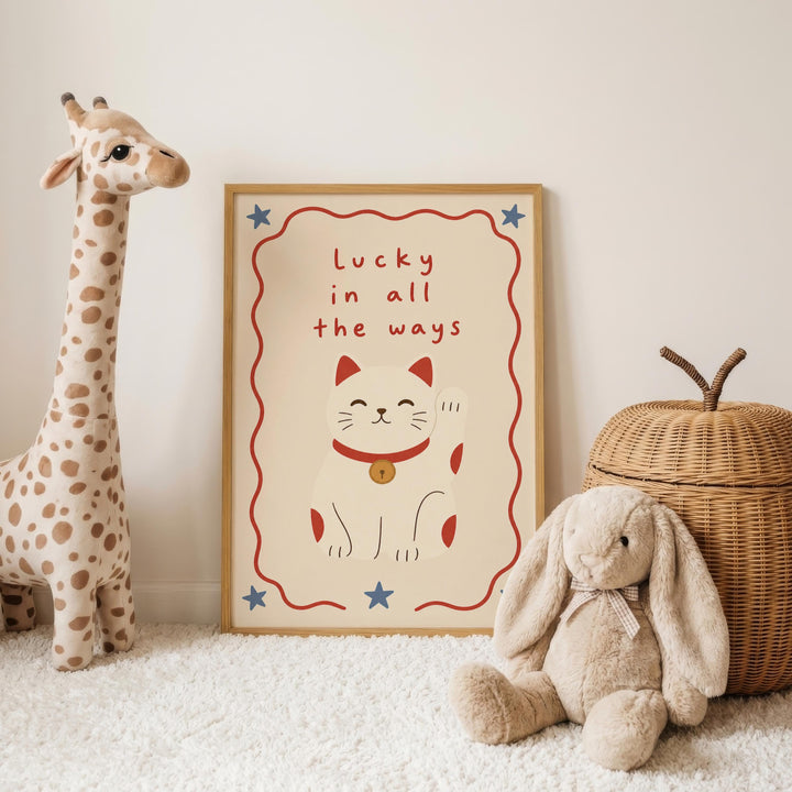 a framed poster with a cat and a rabbit, along with a giraffe and a stuffed rabbit, all placed on a white carpet.