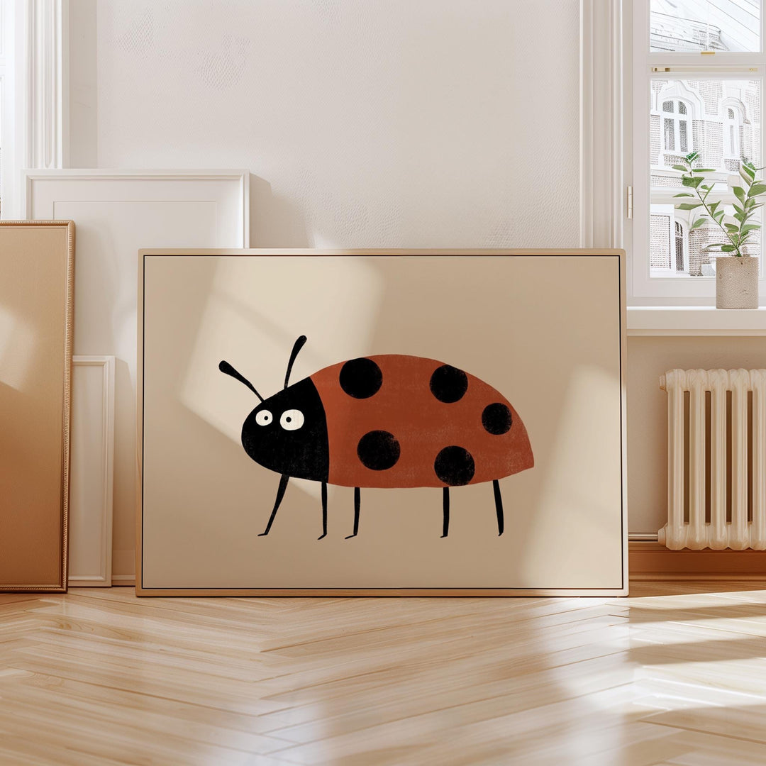 a picture of a lady bug on a wall